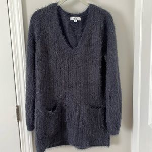 Soft v neck tunic sweater in size small